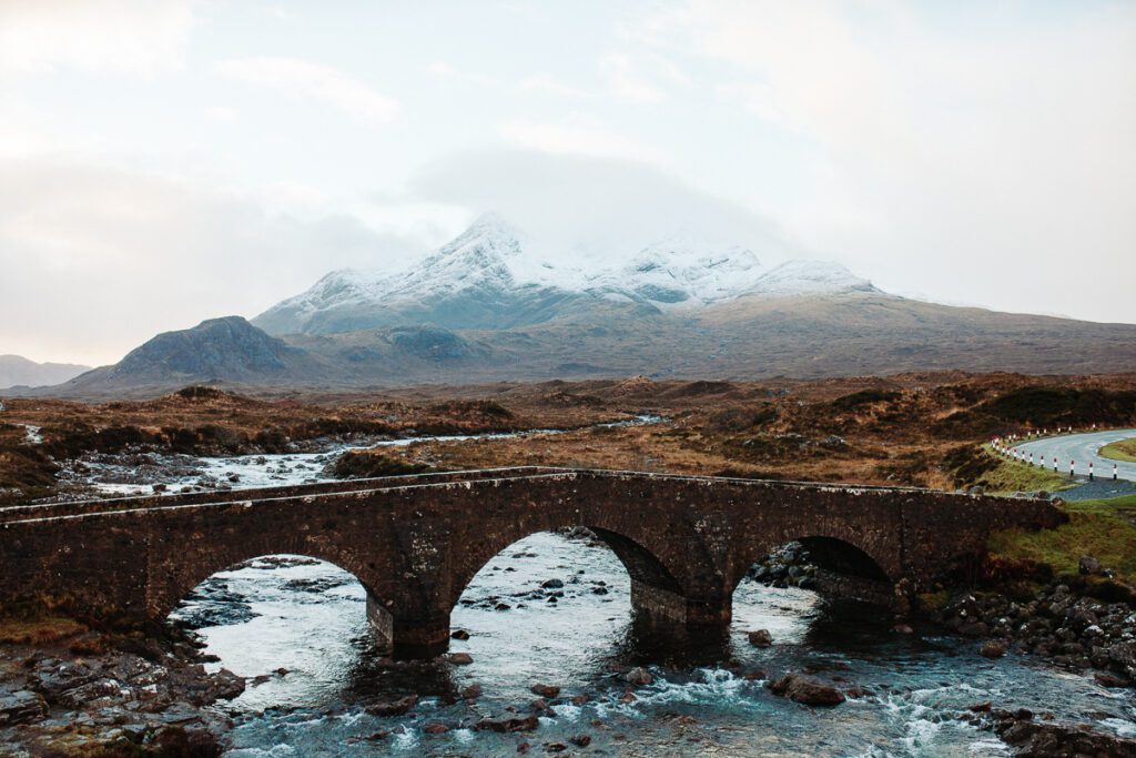 How much does it cost to visit Scotland, mountains in scotland with bridge.