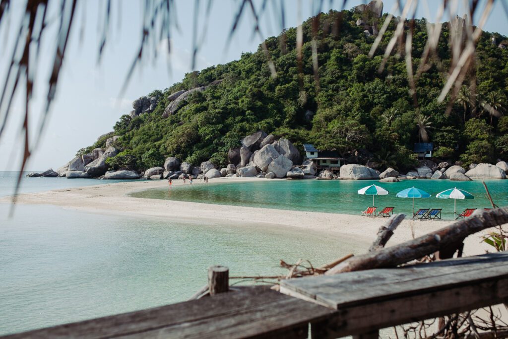 blue waters and tropical umbrellas on Nang Yuan island