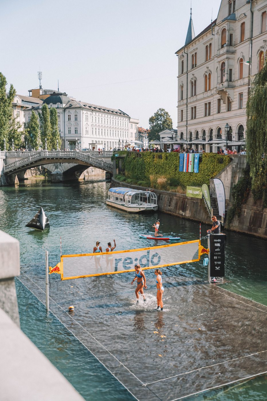 water volleyball game on river in downtown ljubljana city center