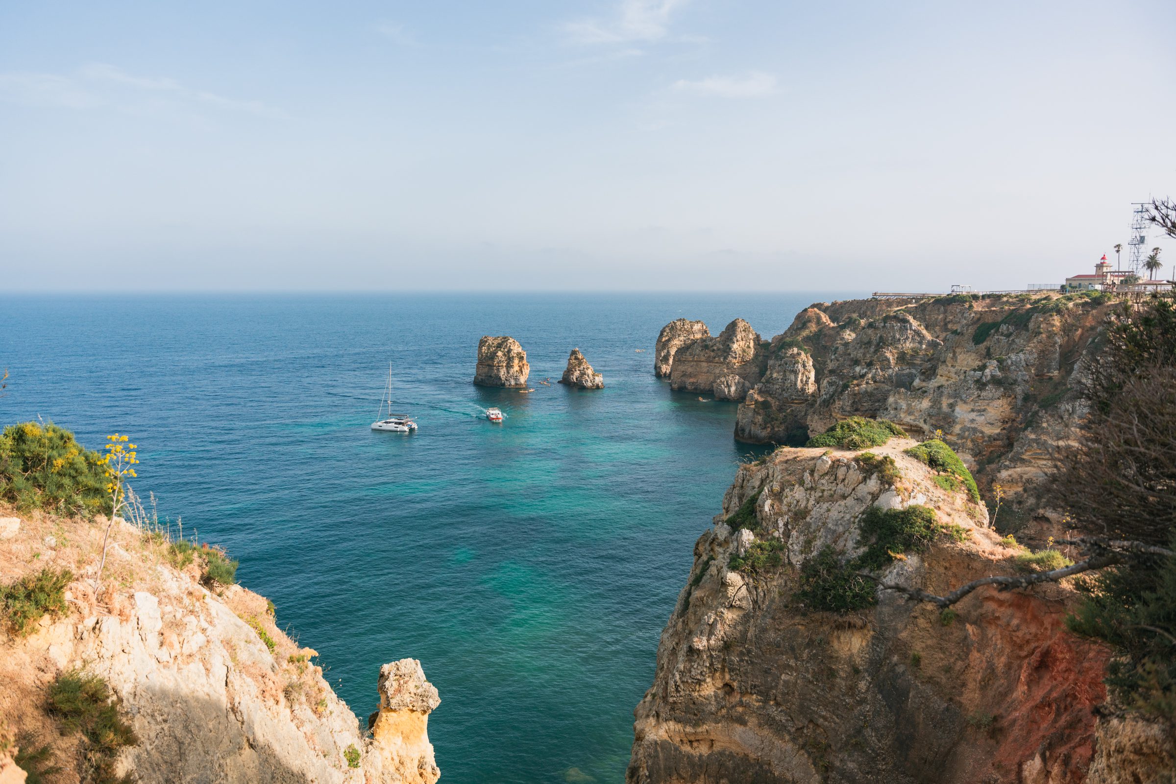 Algarve coastline with boats and blue water 7 day Portugal itinerary