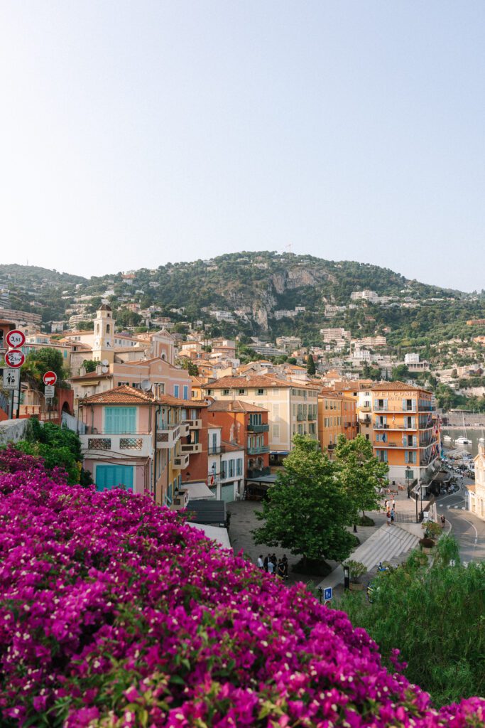 colorful buildings and flowers in Villefranche-sur-Mer, France where to go on a 10 day South of France itinerary