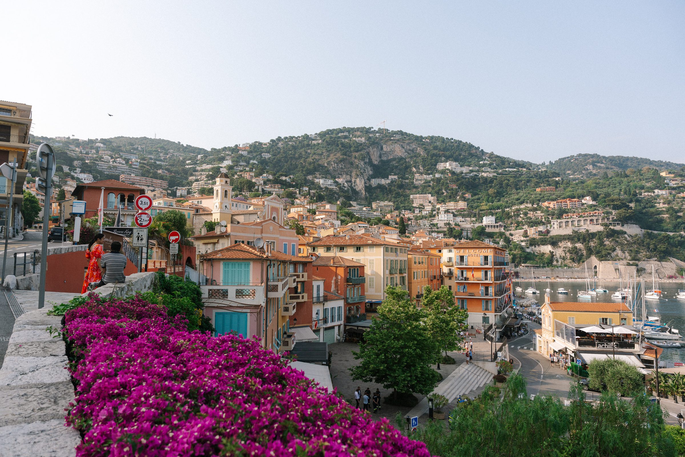 Colorful buildings and flowers in Villefranche-sur-Mer, French Riviera best places to go on a 10 day South of France itinerary
